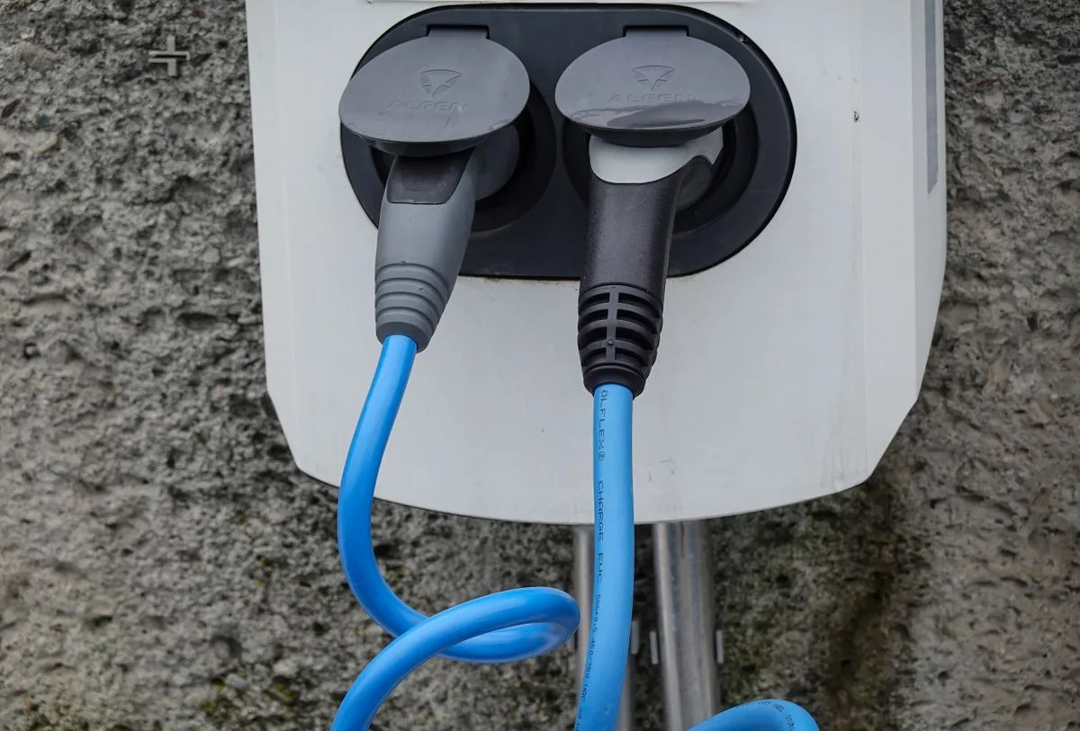 Electric car charger installation — illustrative service photo